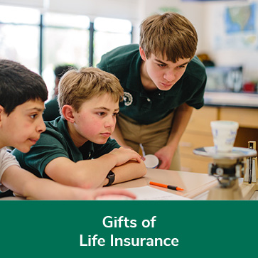 Students working on an experiment. Links to Gifts of Life Insurance